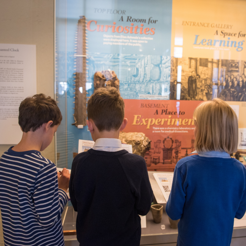 Children exploring a display in the Entrance Gallery at the History of Science Museum